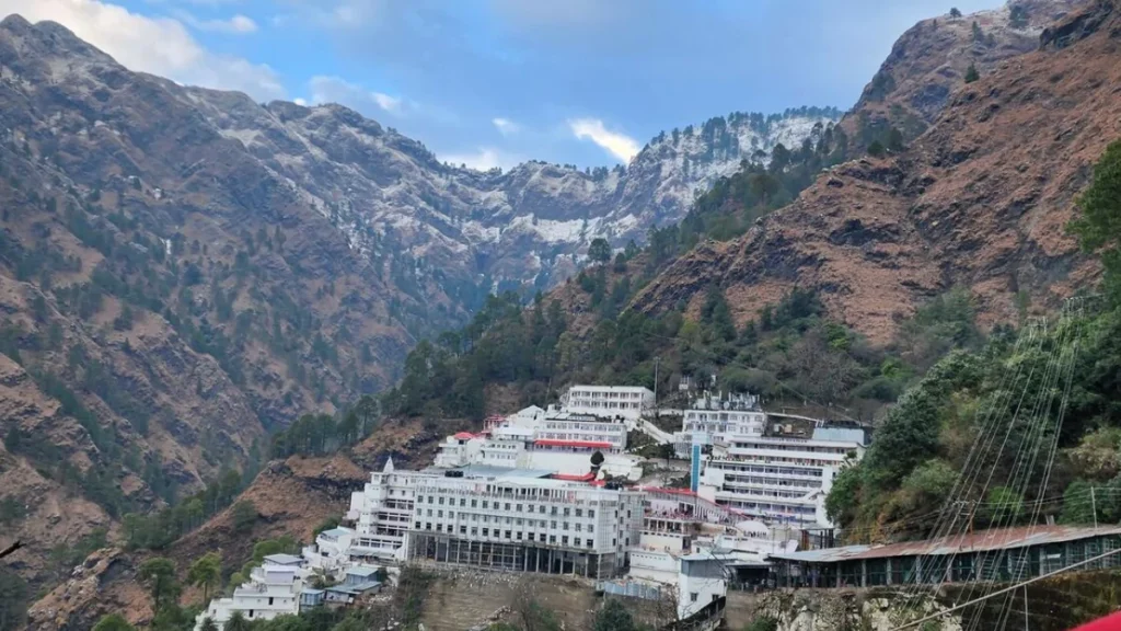 Aerial view during day light of Mata Vaishno Devi Temple nestled in the scenic Trikuta Mountains.